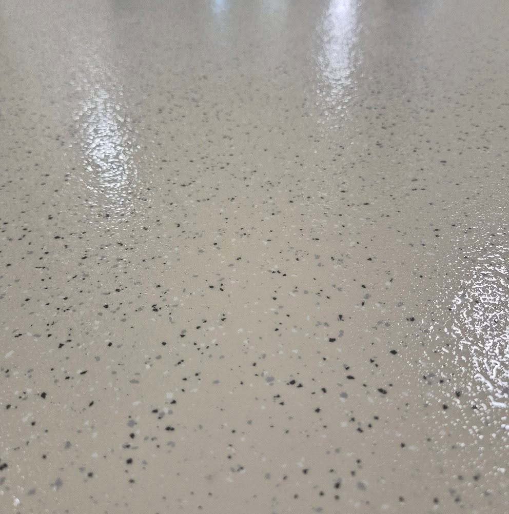 Epoxy flake vloer · detail toplaag